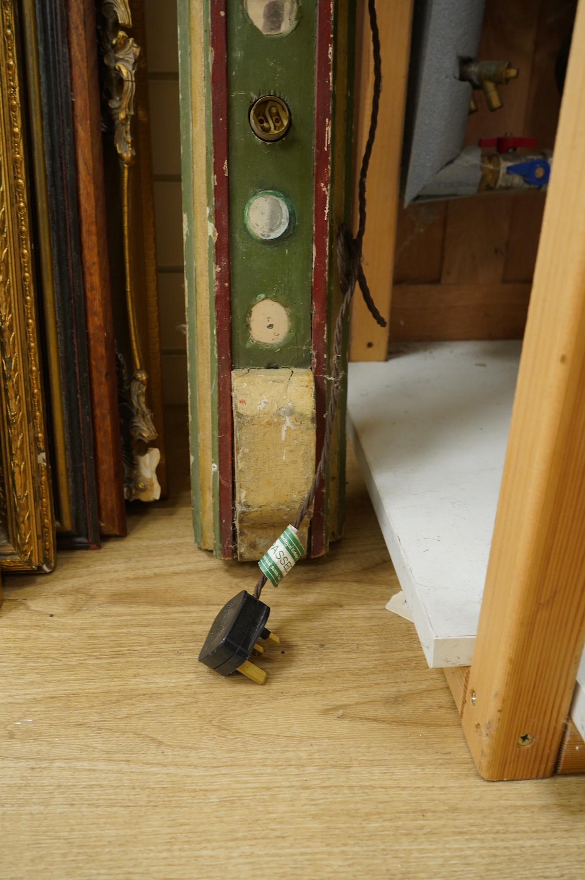 A painted wood carousel rail with light fittings, 185cm high